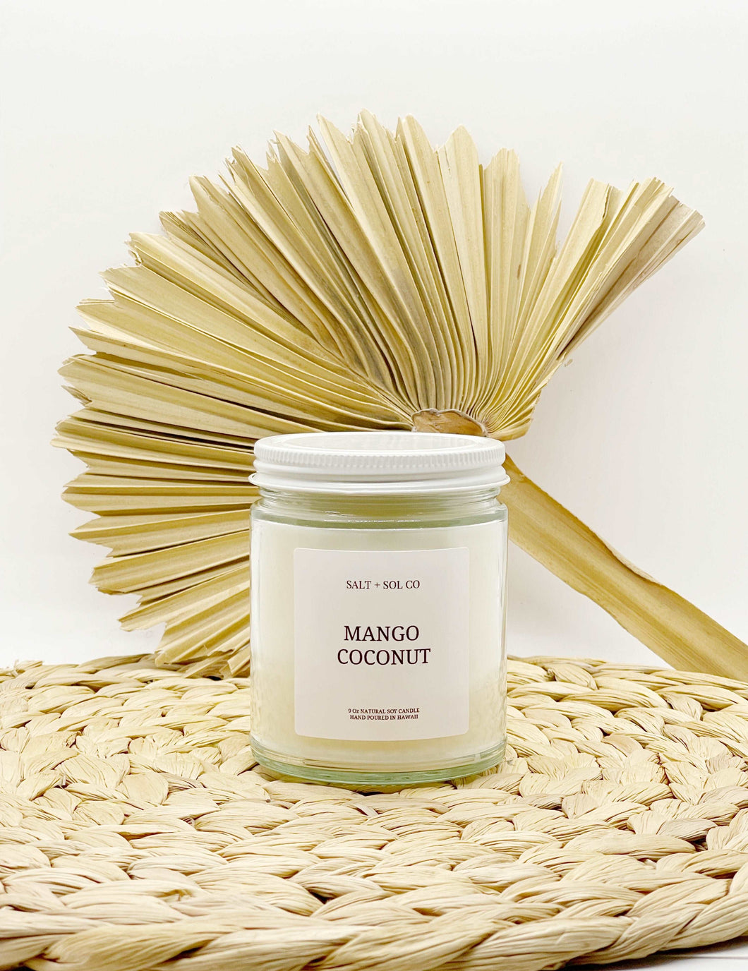 mango coconut scented candle with a tropical blend of juicy mango, creamy coconut milk, and hint of island sweetness
